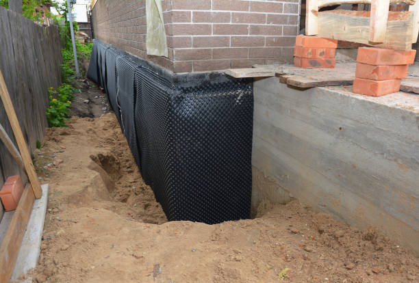 Happy homeowners after waterproofing job in Sale Creek